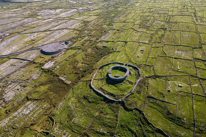 Aran Islands Scenic Flight and Galway Rail Tour from Dublin - Inis Mor touring by bus: dry stone walls, churches, and that Celtic feel