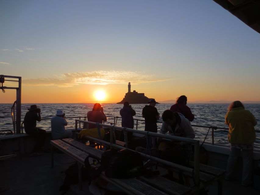 Baltimore Harbor: Sunset Cruise to Fastnet Rock Lighthouse - Sailing past Sherkin Abbey ruins and the Sherkin Island coastline