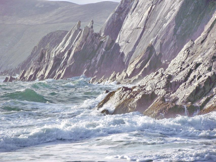 Dingle Peninsula & Slea Head Drive: Tour from Killarney - Dunbeg Fort and Gallarus Oratory: cliffs and early stone chapels