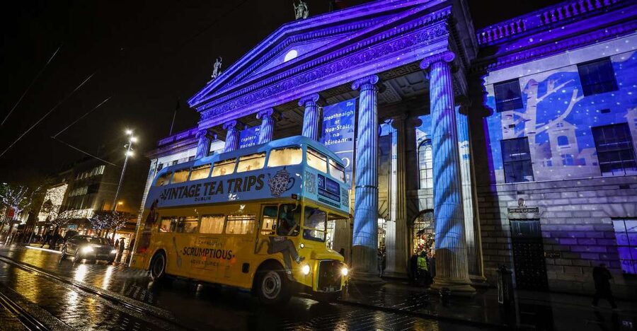 Dublin: Christmas Lights Festive Bus Tour with Afternoon Tea - The sightseeing loop: City Hall and Trinity College in Christmas lights