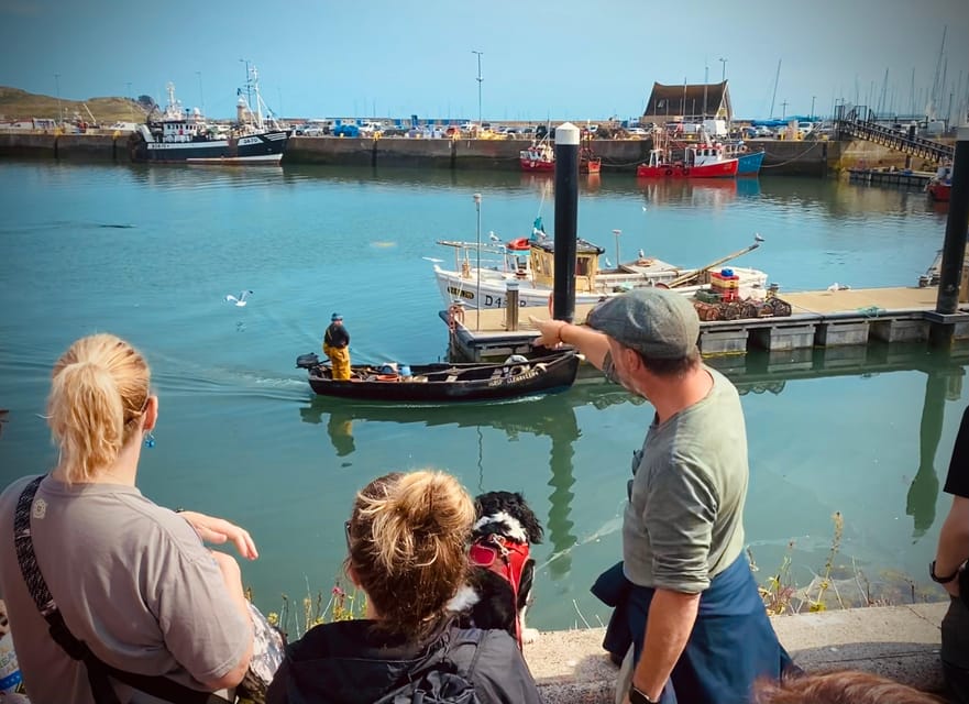 Dublin: Dublin Coastal Hike and Pints & Puppies - From Fishing Village Feel to Cliff Views Over Dublin Bay