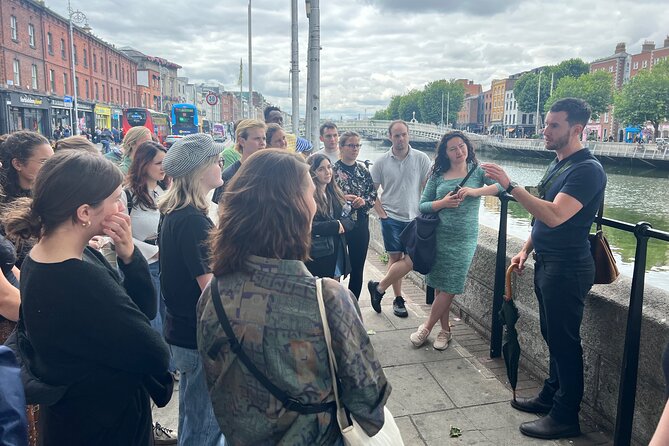 Dublin Highlights and Hidden Gems Guided Walking Tour - Ha’penny Bridge and the River Liffey: postcards, plus meaning