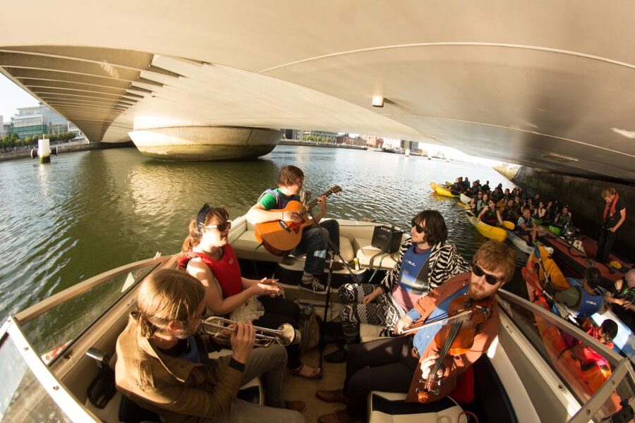 Dublin: Music Under the Bridges Kayaking Tour - Paddling to the stage boats, then stopping under bridges for the shows