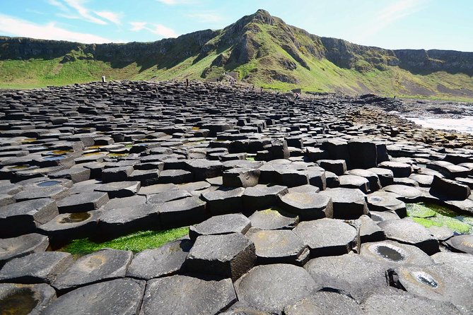 Dublin to Belfast Black Cab, Dunluce Castle and Giant's Causeway - Belfast black cab tour: why the murals and walls land differently