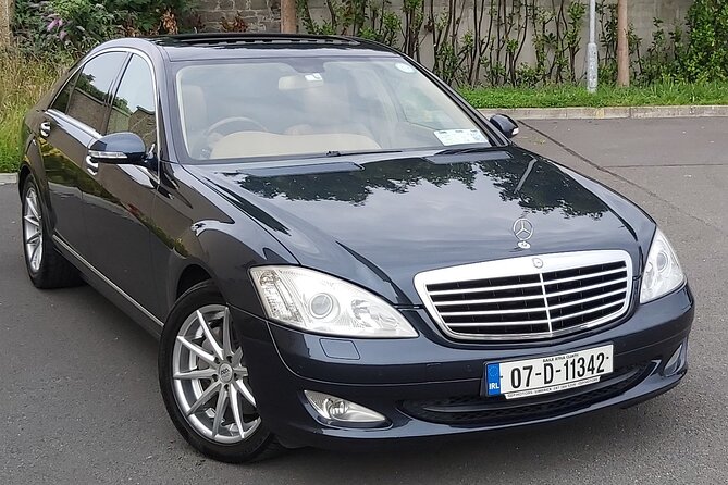 Galway: Private transfer to & from Shannon Airport | Premium Cars - What Happens When You Land: Tablet Sign, Luggage Help, and Quick Direction