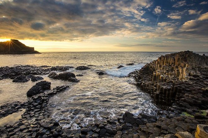 Giant Causeway, Dark Hedges & Whiskey Distillery tour from Dublin - Stop 1: Dunluce Castle on the basalt coast, quick and unforgettable