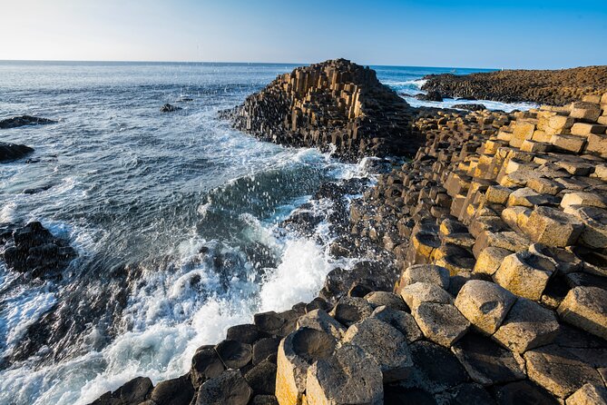 Giant's Causeway with the Titanic Exhibition and the best of Northern Ireland - Belfast City Hall stop, quick stroll time and snack options