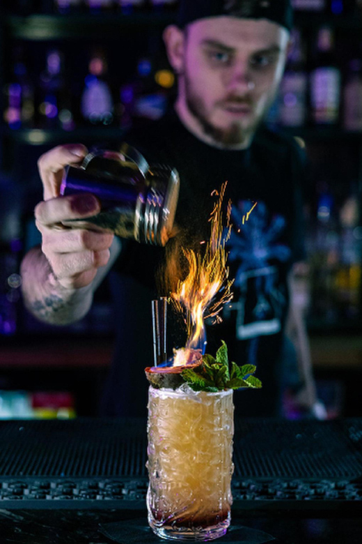 Premium Cocktail Class - Finding the venue: purple lights and stairs down